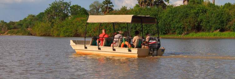 Sunrise Boat Safari, Maasai Village Tour and Fly Back to Zanzibar